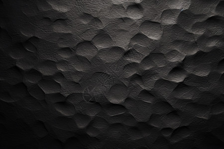 凹凸不平的黑色墙壁图片