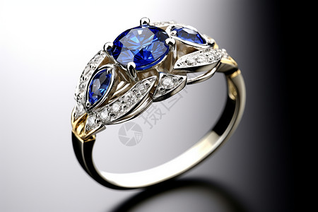 一枚镶有蓝白色宝石的戒指背景图片