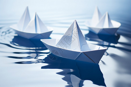 纸张折叠水面上的纸船背景