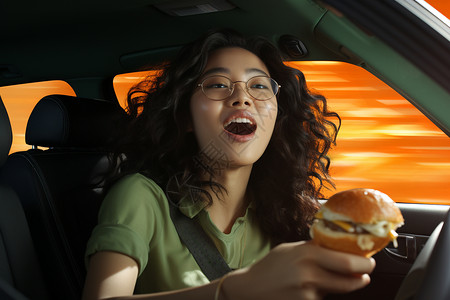 女孩车上吃汉堡高清图片