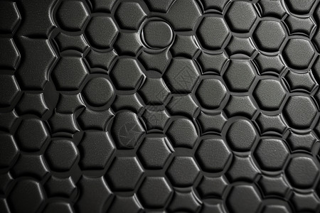 黑金属表面图案六边形格纹软垫背景