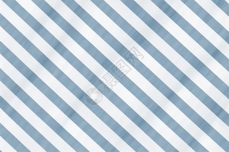 彩色绸缎彩带蓝白相间的布纹背景