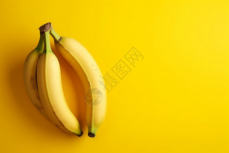 黄色背景上的香蕉水果背景图片