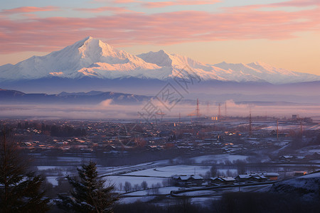 冬日山脉下的小城背景图片