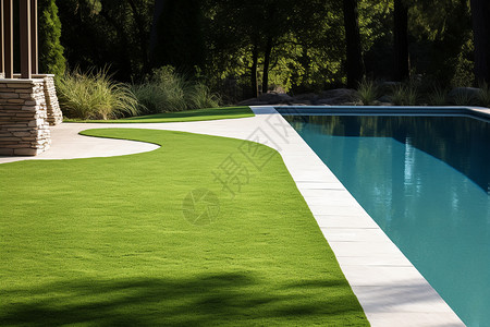 草坪旁的泳池背景图片