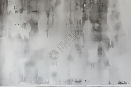 水泥墙上剥落的白灰背景图片