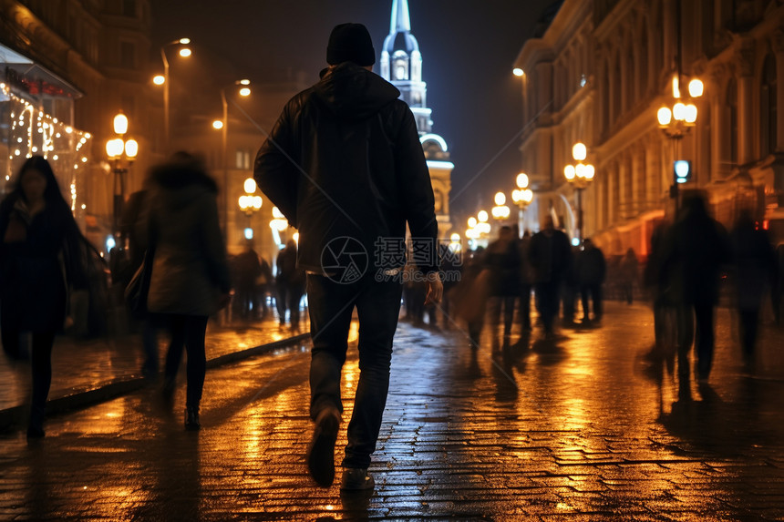 城市夜晚街道上的行人图片