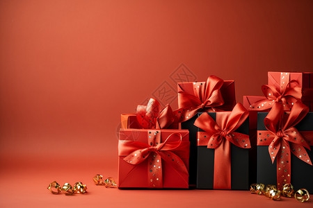红黑礼物盒团坐红底上背景图片