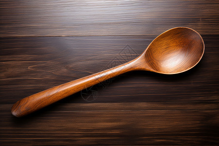 木桌上的勺子木勺高清图片素材