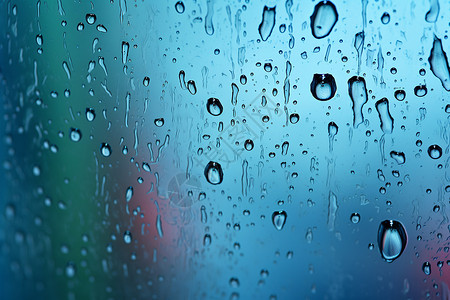 雨后沾满雨滴的玻璃高清图片