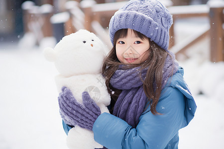 雪地拥抱抱着玩偶的可爱女孩背景