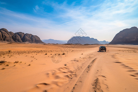 行驶在沙漠里的汽车背景图片