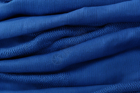 一块蓝色的织物背景图片
