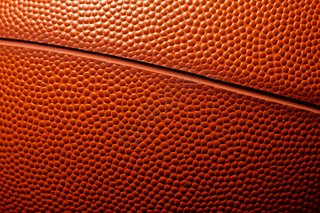 橘色篮球的细节纹理背景图片