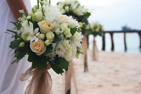 捧花素材沙滩上拿着捧花的新娘背景