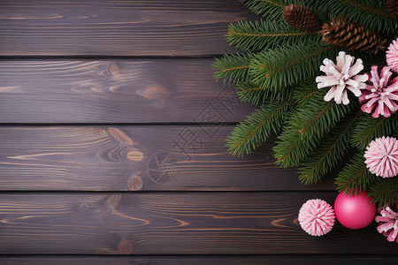 木质桌上的圣诞树枝背景图片