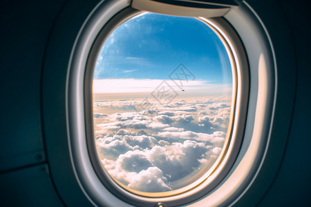 飞机窗户外的云彩背景图片