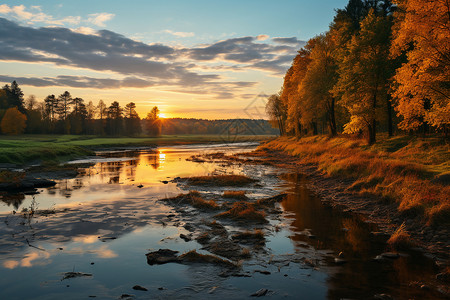 秋日黄昏下的河岸风景背景图片