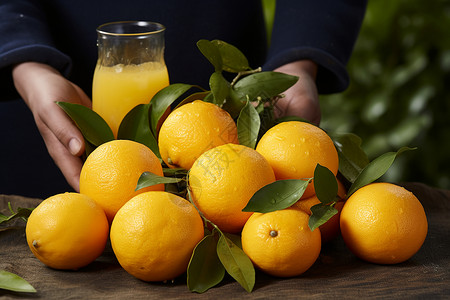 橙汁与橙子堆背景图片