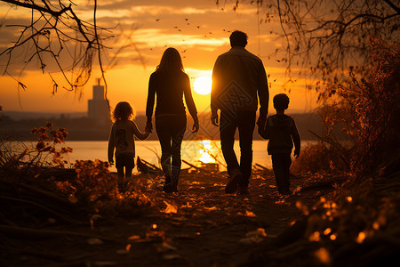 黄昏下的家庭漫步背景图片