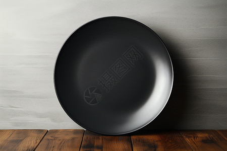 黑色的盘子背景图片