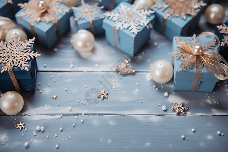 蓝色礼物盒上的雪花背景图片