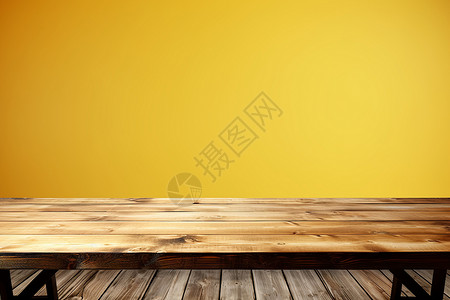 黄色背景前的原木桌背景图片