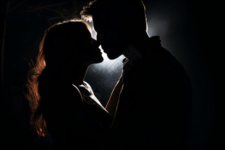 黑暗中接吻的恋人背景图片