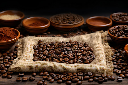 桌面上新鲜烘焙的咖啡豆背景图片