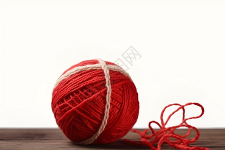 红线背景红线缠绕的棉线球背景