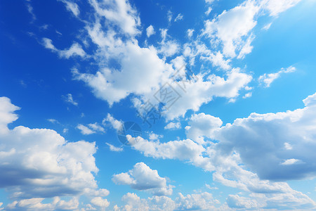 蔚蓝天空上的白云背景图片