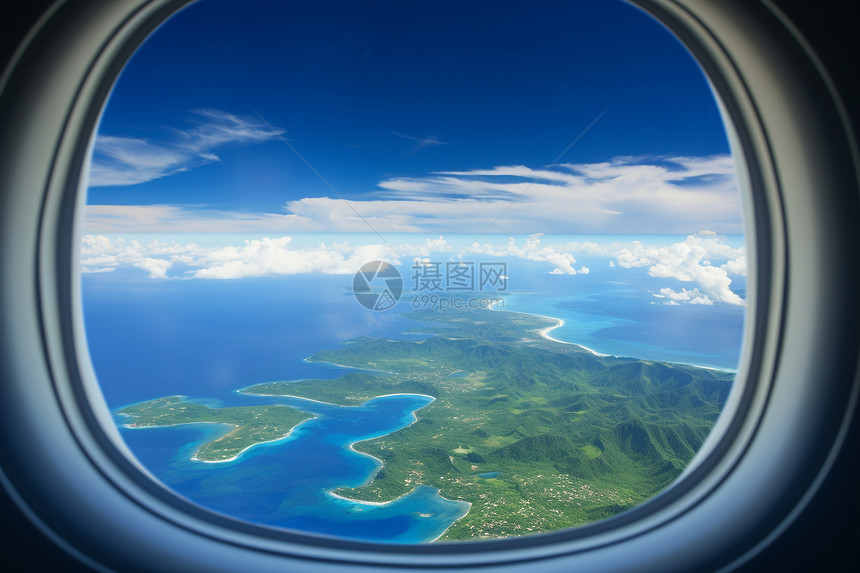 飞机窗外的美丽岛屿景观图片