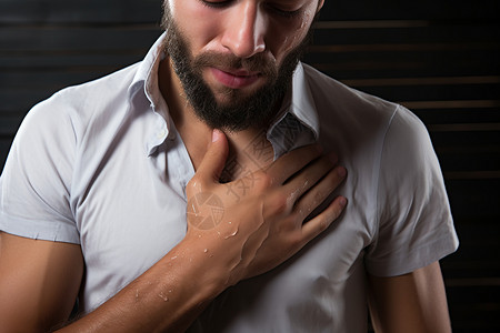 胸口疼痛的外国男子背景图片