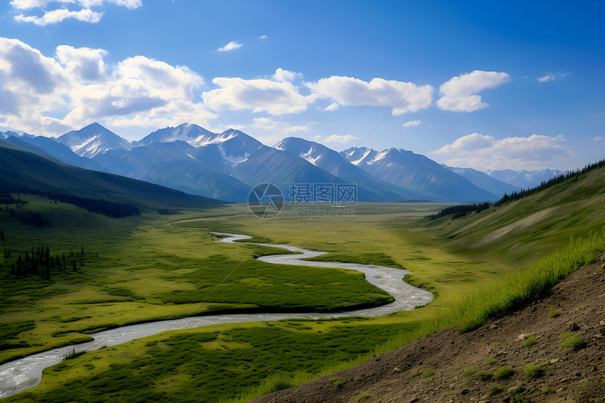 雪山下的草原河流图片