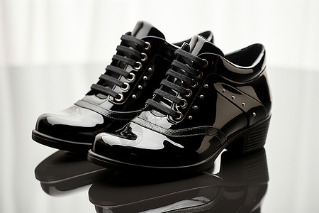 优雅的黑色皮鞋背景图片