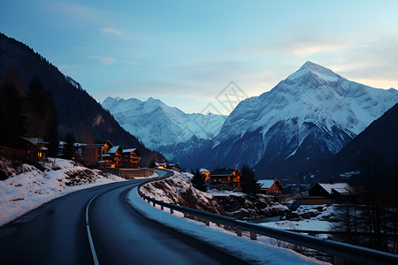 雪山下的村庄背景图片