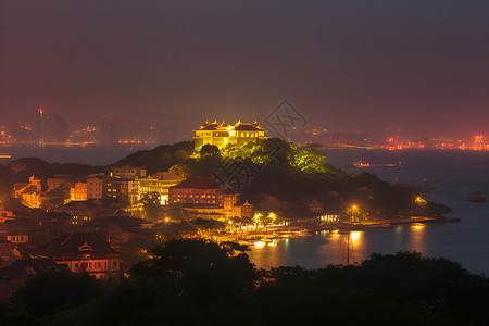 灯火通明的海港城市建筑景观背景图片