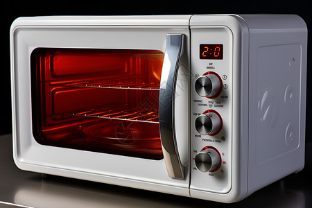 烤箱烘烤桌面上的电子微波炉背景
