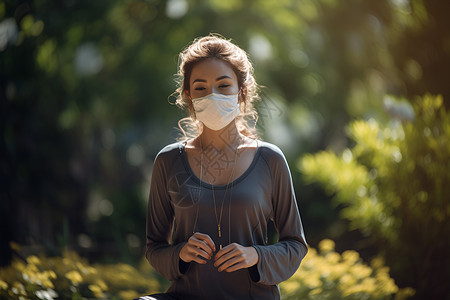 戴口罩防护病毒的运动女性背景图片