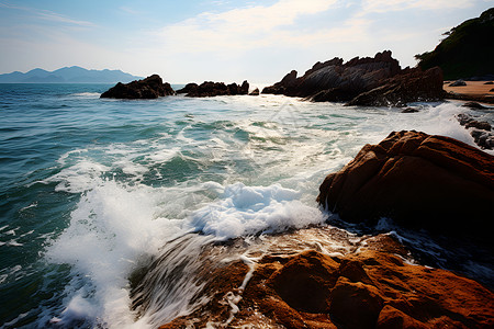 海洋中腐蚀的岩石背景图片