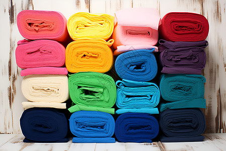 堆放的纺织品毛巾背景图片