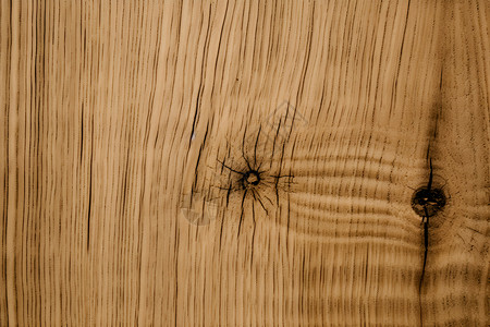木质纹理中的黑洞背景图片