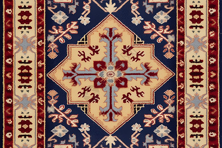 蓝色与红色花卉图案的地毯背景图片