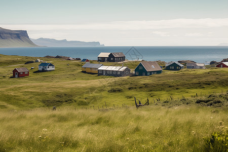 草地远处的农舍背景图片