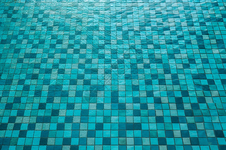 蓝色方块背景清澈的游泳池背景