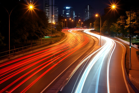 灯火通明的夜晚城市道路背景图片