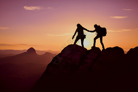 山谷中攀登的情侣背景图片