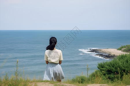 夏季观海拍照的美丽女子背景图片