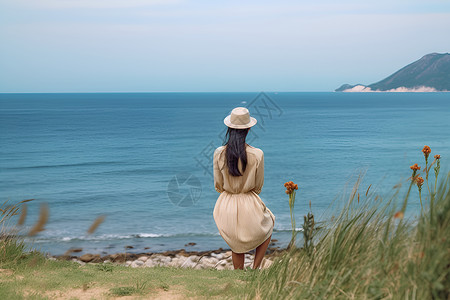 海岸线上的美丽女子背景图片