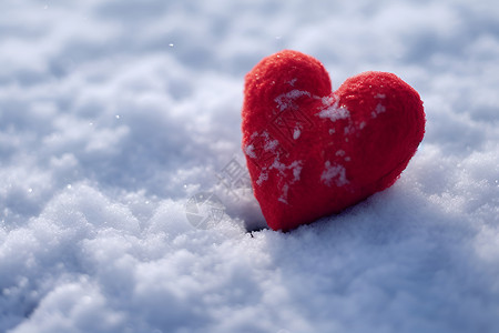 雪地里一颗红色心形背景图片